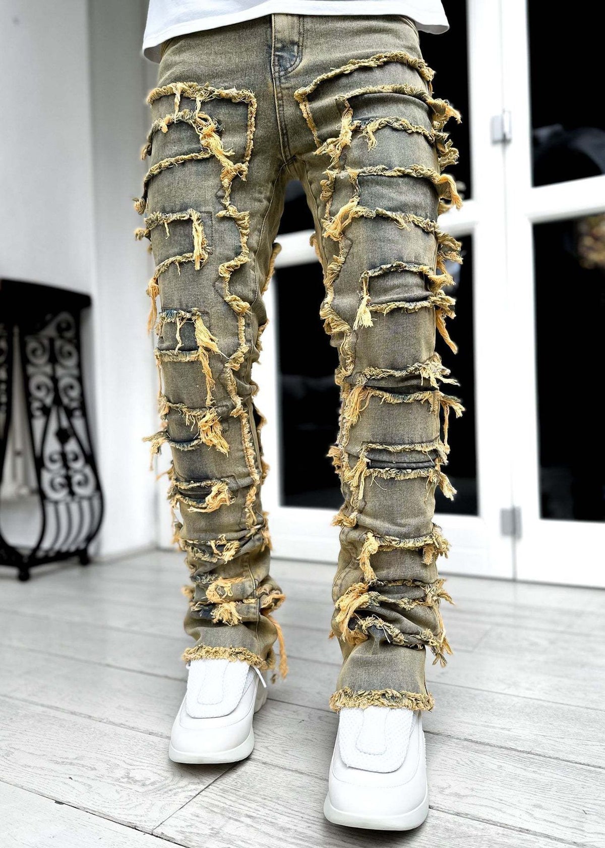 Men's Ripped Fringe Patched Jeans in a Slim Stacked Fit