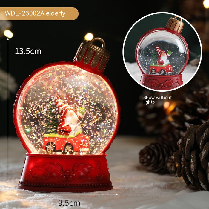 Valoa tuova litteä LED-joulukoriste, jossa on joulupukki, lumiukko ja enkeli