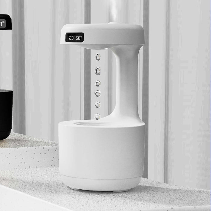 Humidificateur antigravité avec horloge et effet de gouttes d’eau remontant