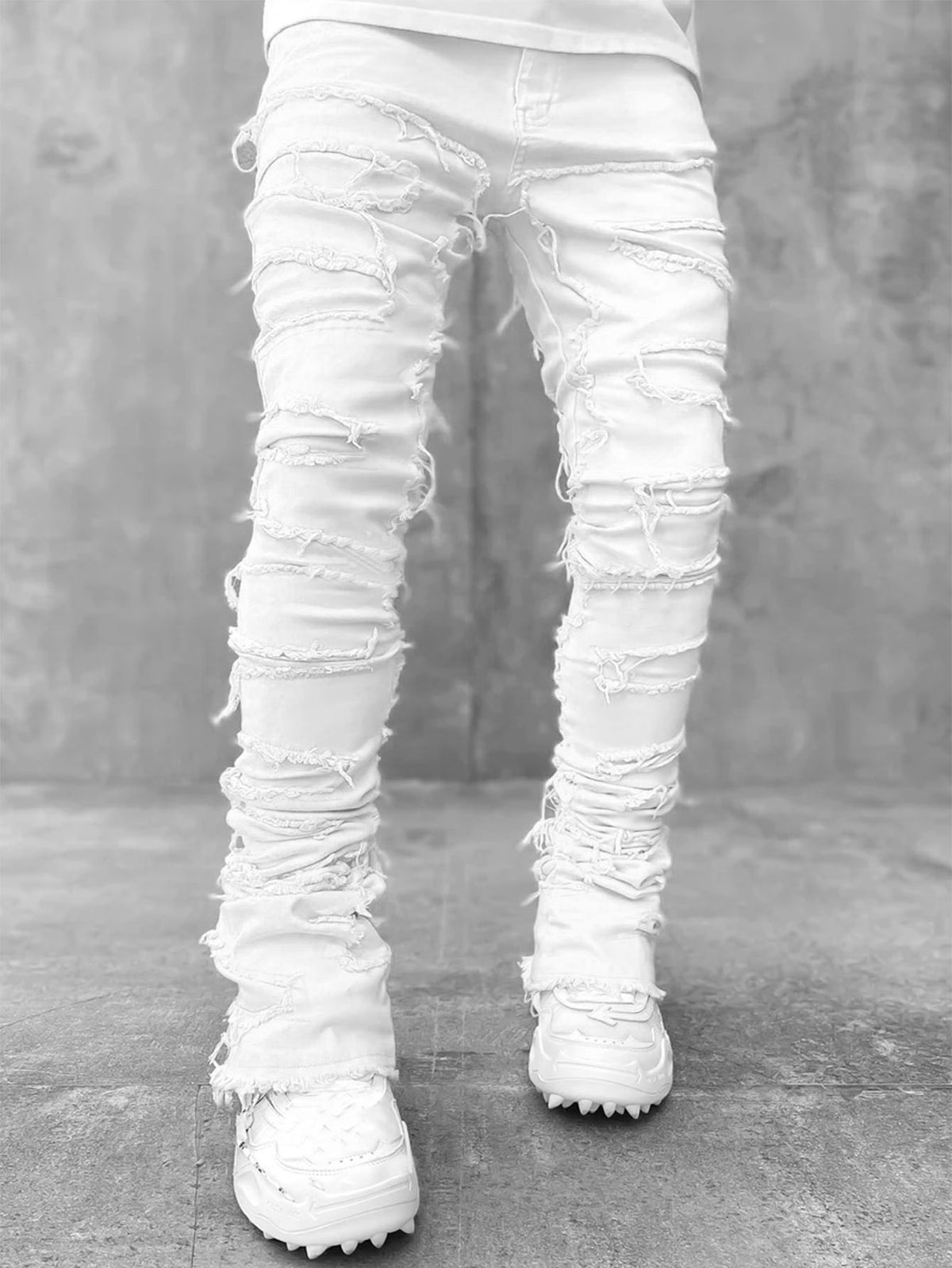 Men's Ripped Fringe Patched Jeans in a Slim Stacked Fit